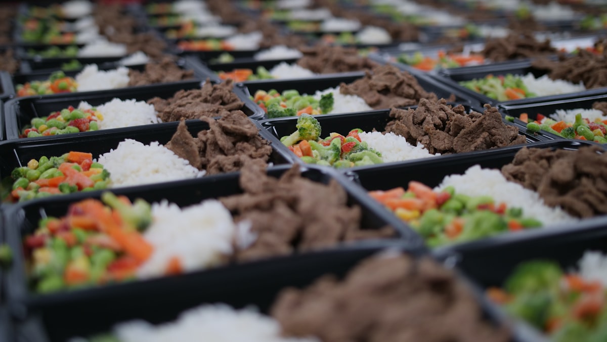 Meal prep containers with organized ingredients